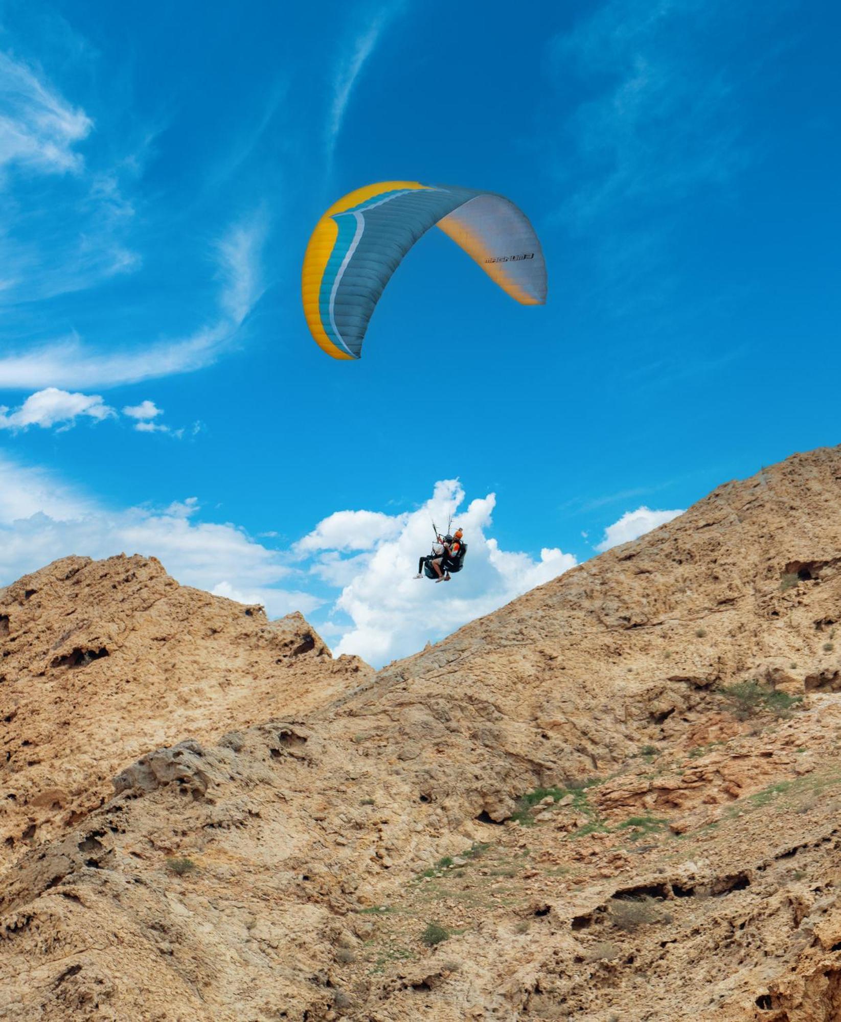 Al Badayer Retreat By Sharjah Collection Hotel Margham Exterior photo Parachute landing on the top of the mountain