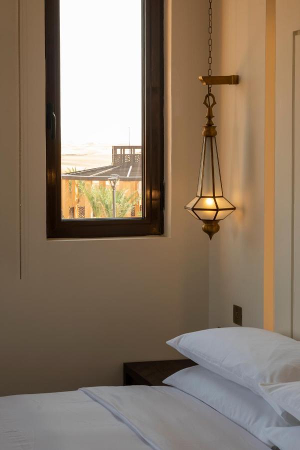 Al Badayer Retreat By Sharjah Collection Hotel Margham Exterior photo A hanging lamp
