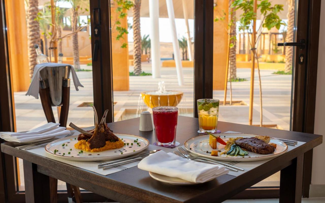 Al Badayer Retreat By Sharjah Collection Hotel Margham Exterior photo A meal at a restaurant