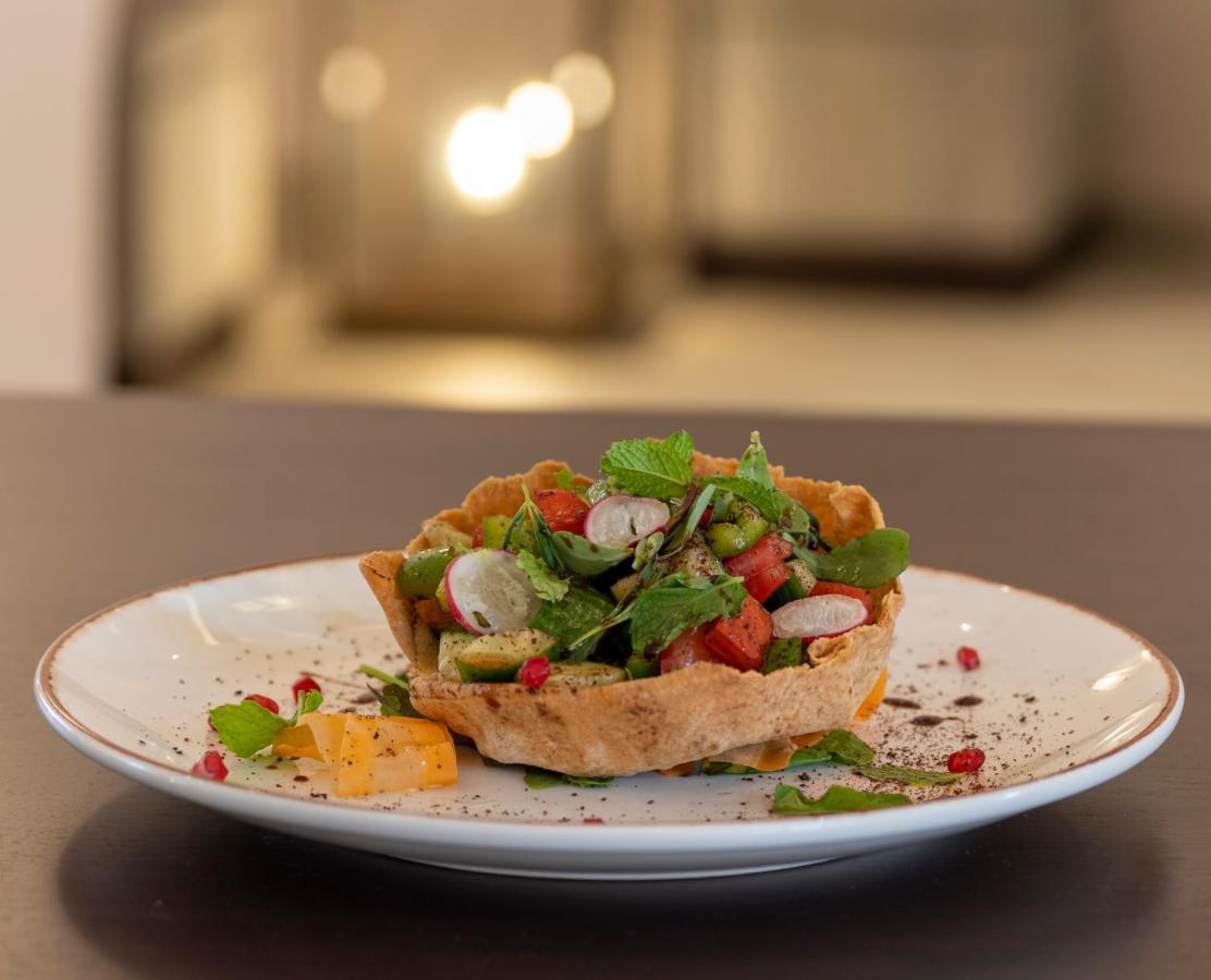 Al Badayer Retreat By Sharjah Collection Hotel Margham Exterior photo Israeli salad